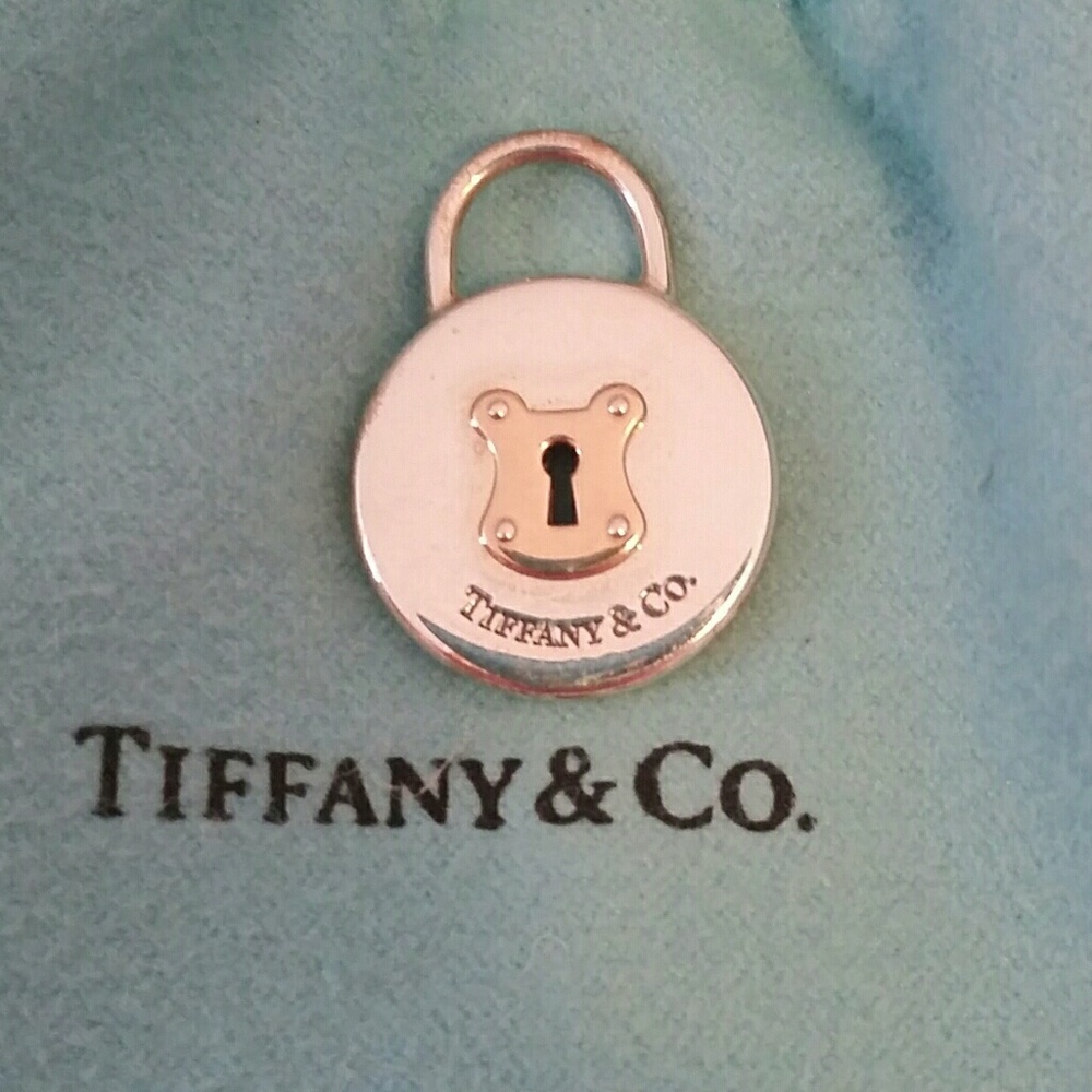 Tiffany & Co 18k & silver round padlock charm